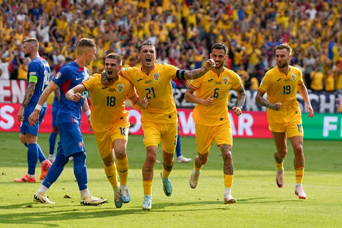 Razvan Marin celebrates after scoring his side's first goal